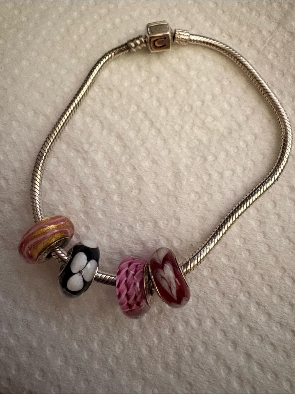 4 Chamilia charms with Chamilia bracelet